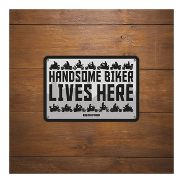 Oxford Garage Metal Sign: Handsome Biker Lives Here